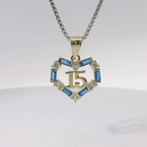 14KT Gold Charm Medium Quinceanera Open Heart with Royal Blue Baguette and White Round CZ Stones Outline with Plain Bell