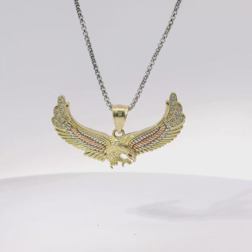14KT Gold Charm Medium Tri Tone Spread Eagle with Red CZ Eye, White CZ Stone Wing Tips, and Plain Bell