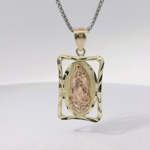 14KT Gold Charm Medium Open Rectangle Frame Two Tone Virgin Mary Oval Coin Center with Diamond Cut Open Frame Border and Plain Bell