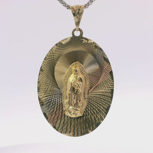 14KT Gold Charm Large Tri Tone Oval Virgin Mary Coin with Graphic Line Background and Plain Bell