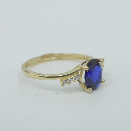 14KT Gold Ring Women's Navy Blue Oval Center CZ Stone with 3 High/Low Round White CZ Stones Shoulders and Plain Band