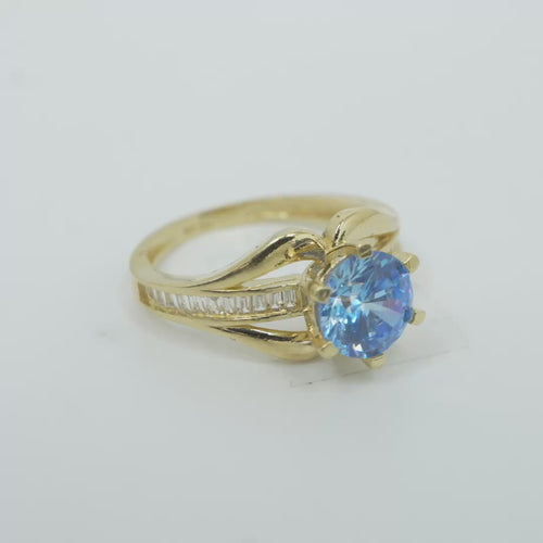14KT Gold Ring Women's Light Blue Round 6 Prong Center CZ with White Baguette CZ Band and Plain Lips Border