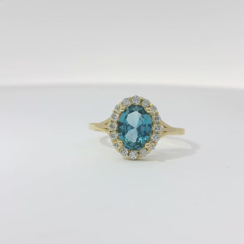 14KT Gold Ring Women's Oval Turquoise CZ Stone Center with Round White CZ Stones Border and Mini Plain Double Split Band