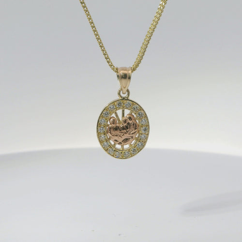 14KT Gold Charm Small Oval Two Tone Communion Open Stripe Center with White CZ Stones Border and Plain Bell