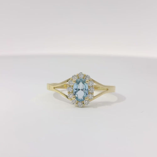 14KT Women's Gold Ring Mini Oval Light Blue Center CZ Stone with Round White CZ Stones Border and Plain Split Band