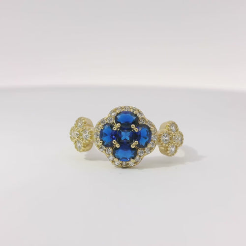 14KT Gold Ring Women's Jumbo Flower Navy Blue Square CZ Stone Center Four Navy Blue CZ Stone Oval Petals with Two White CZ Stone Side Flowers and Borders with Plain Band