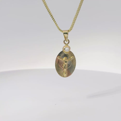 14KT Gold Charm Small Tri Tone Oval Crucifix Graphic Coin with White CZ Stone Top and Plain Bell