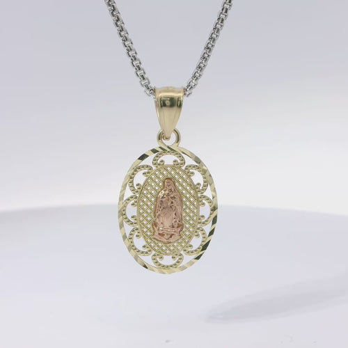 14KT Gold Charm Medium Two Tone Virgin Mary Oval Lattice Background and Diamond Cut Open Swirl Frame and Plain Bell