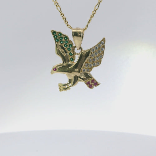 14KT Gold Charm Large Left Facing Soaring Eagle with Round White, Red, and Green CZ Stones Wings, Red CZ Stones Eye and Plain Bell