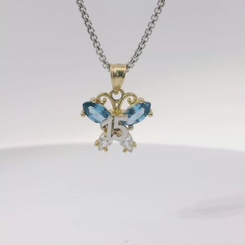 14KT Gold Charm Small Two Tone Quinceanera Butterfly with Light Blue CZ Stones Top Wings and White CZ Stones Lower Wings and Plain Bell