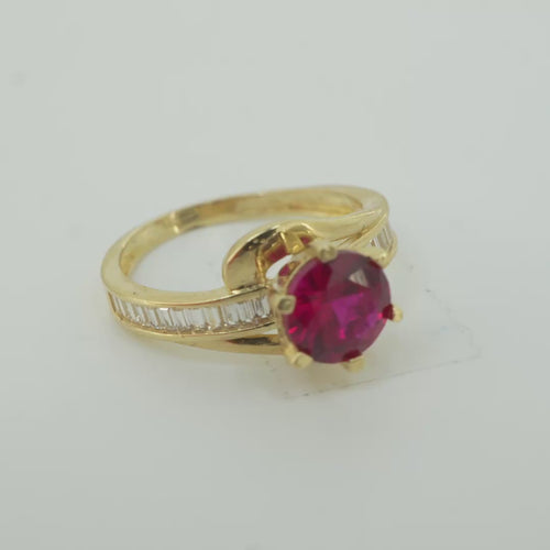 14KT Gold Ring Women's Round Red CZ Center Stone and Single Row White CZ Baguettes with "S" Band
