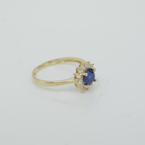 14KT Gold Ring Women's Flower Round Royal Blue Center Stone with White CZ Stone Petals Border Plain Band