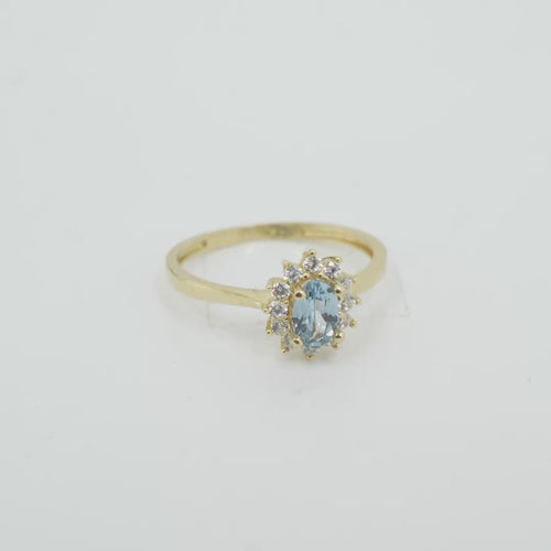 14KT Gold Ring Women's Flower Oval Light Blue Center Stone with White CZ Stone Petals Border Plain Band