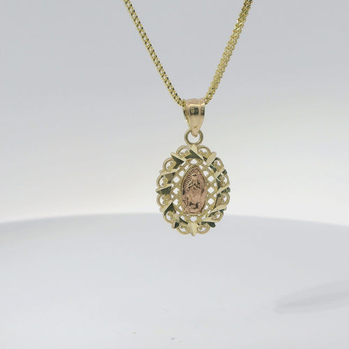 14KT Gold Charm Small Two Tone Virgin Mary Lattice Oval with Diamond Cut Border and Plain Bell
