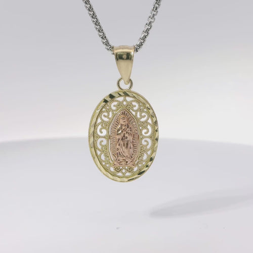 14KT Gold Charm Small Two Tone Open Swirl Oval Virgin Mary with Diamond Cut Edge and Plain Bell