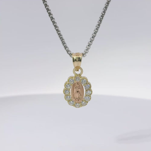 14KT Gold Charm Small Two Tone Oval Virgin Mary with White CZ Stones Border and Plain Bell