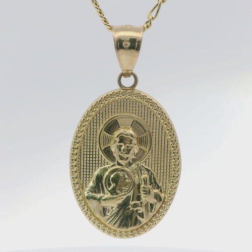 14KT Gold Charm Medium Oval Jesus Holding a Coin with Beaded Border and Plain Bell