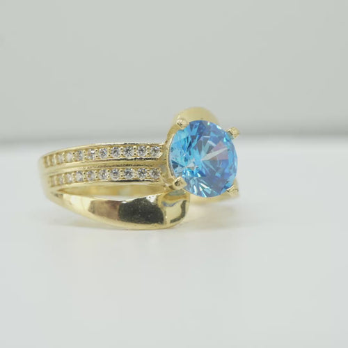 14KT Gold Ring Women's Round Light Blue CZ Center Stone Double White CZ Stone Band with Plain "S" Ribbon