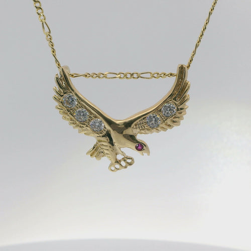 14KT Gold Charm Extra Large Right Facing Soaring Eagle with Round White CZ Stones on Wings, Red CZ Stone Eye, and Plain Bell