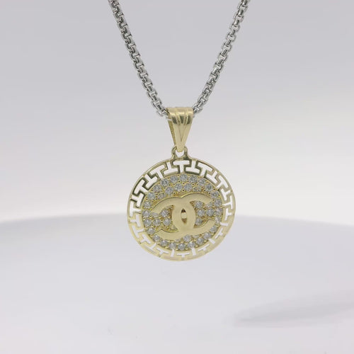 14KT Gold Charm Medium CC Coin with White CZ Stones Center and Open Greek Borders with Plain Bell