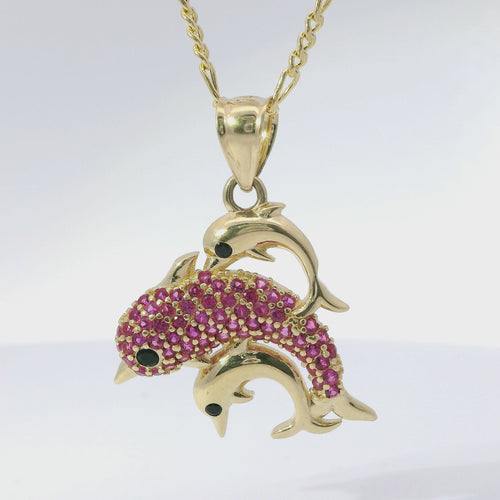 14KT Gold Charm Three Medium 3D Dolphins with Dark Pink CZ Stones Body, Black CZ Stones Eyes, and Plain Bell