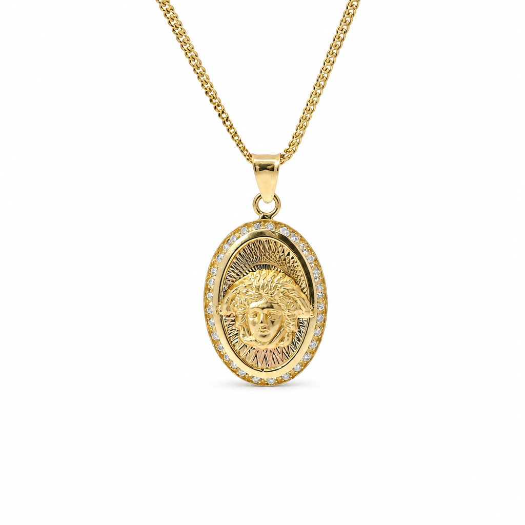 14KT Gold Charm Medium Oval Tri Tone Graphic Line Background with Medusa Center Coin with White CZ Stones Frame Edge and Plain Bell