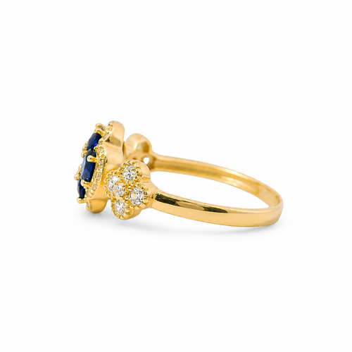14KT Gold Ring Women's Jumbo Flower Navy Blue Square CZ Stone Center Four Navy Blue CZ Stone Oval Petals with Two White CZ Stone Side Flowers and Borders with Plain Band